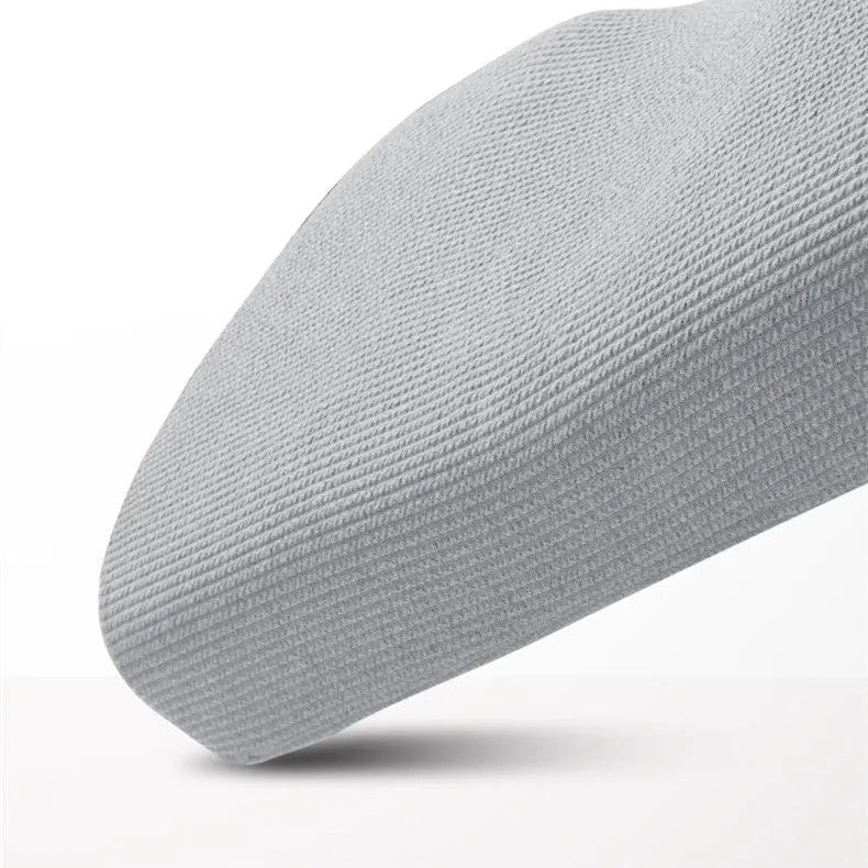 Grey memory foam neck support pillow with knitted cotton cover and adjustable inserts