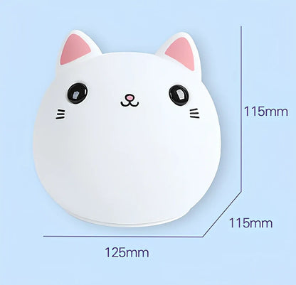 White silicone cat LED lamp with warm glow, measuring 12.5cm tall with USB charging port