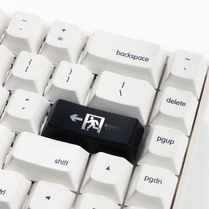 Transparent keyboard key cap with safety evacuation exit symbol design