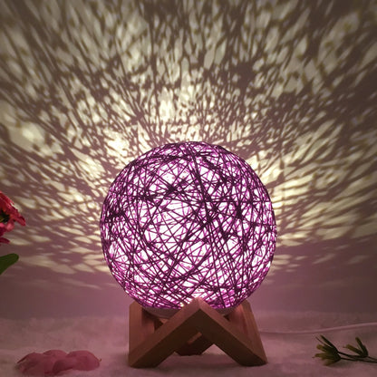 LED rattan table lamp with hand-knit linen shade in various colours