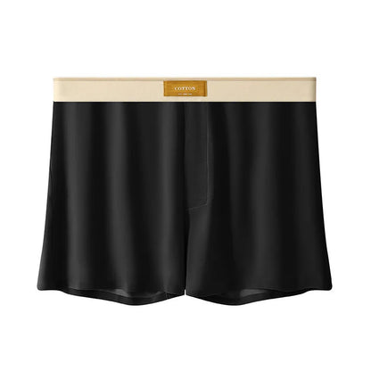 Pack of three pairs of solid colour men's ice silk briefs on a white background