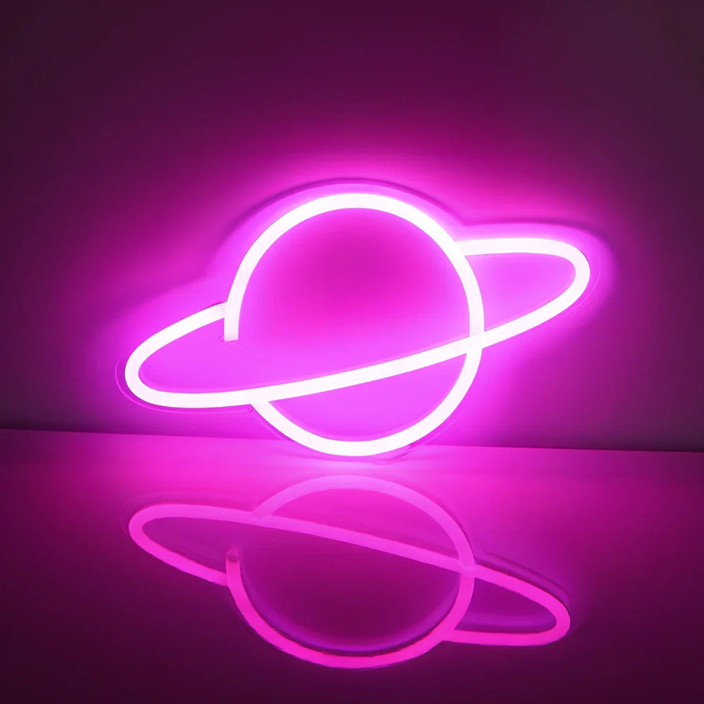 USB-powered neon wall lamp showing Banana shape with pink lighting against dark wall