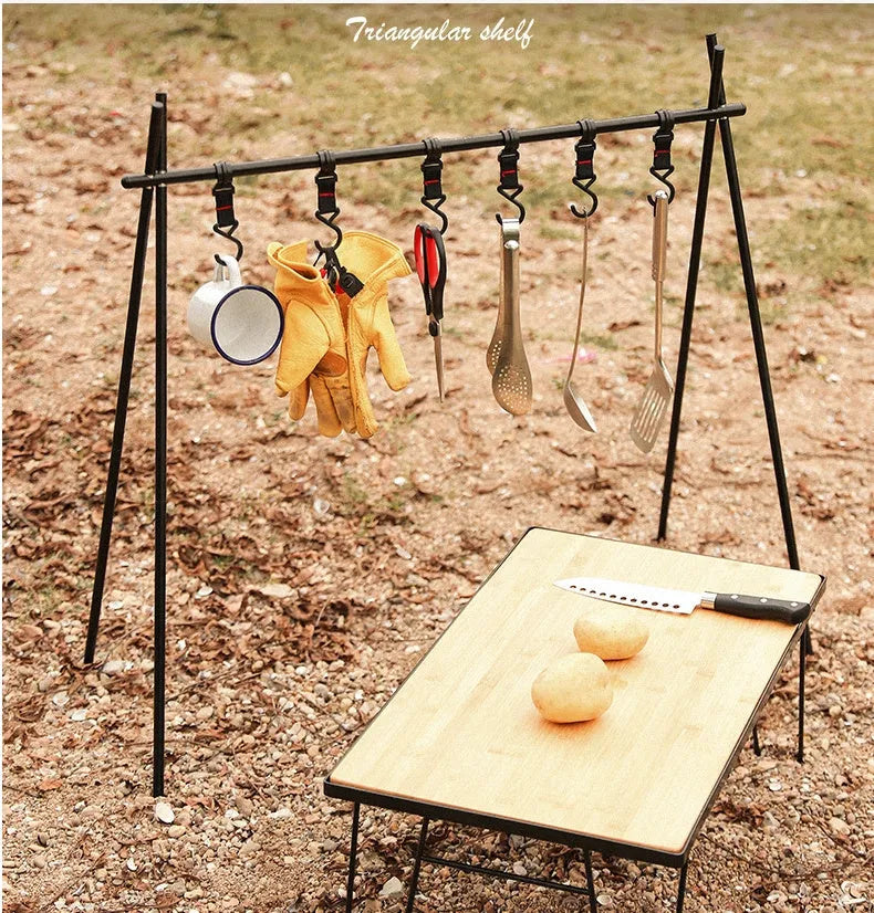 Aluminium alloy folding clothes drying rack with triangle frame and side hanger hooks for camping.