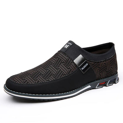 Men's grey and white synthetic leather slip-on casual shoes with a square toe and flat rubber sole.