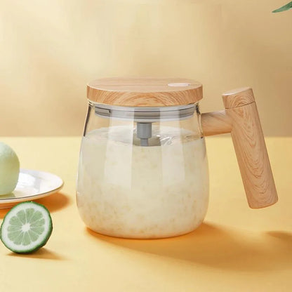 Clear borosilicate glass electric self-stirring coffee mug with 400ml capacity.