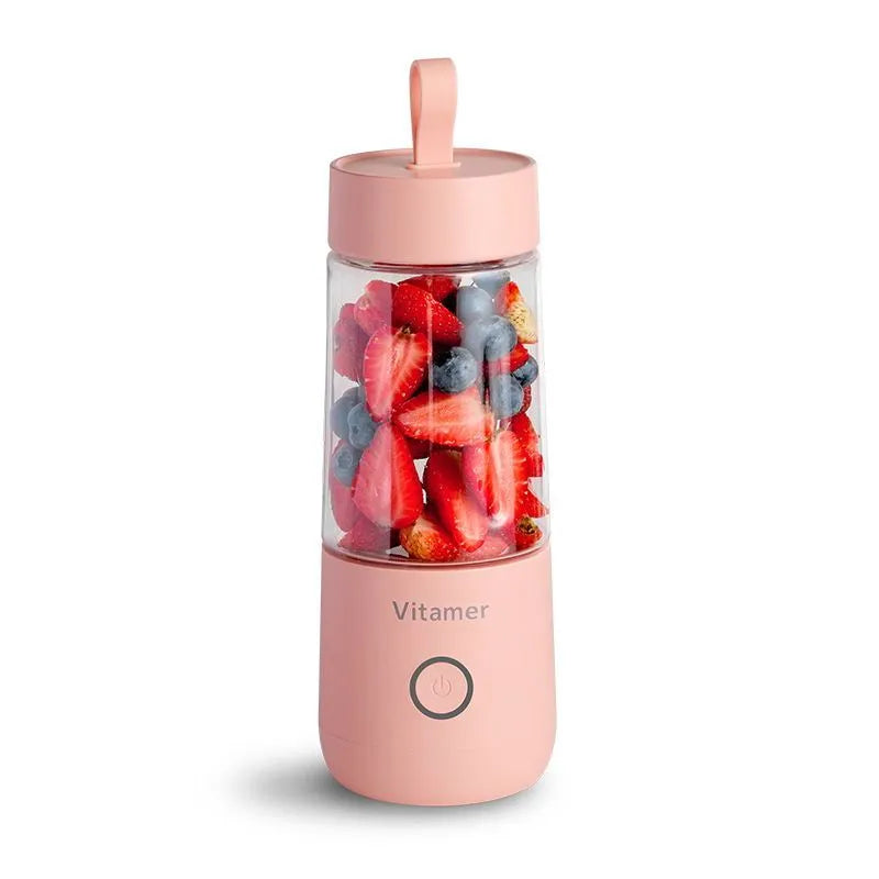 White portable USB rechargeable blender bottle with silicone handle on a Tritan cup.