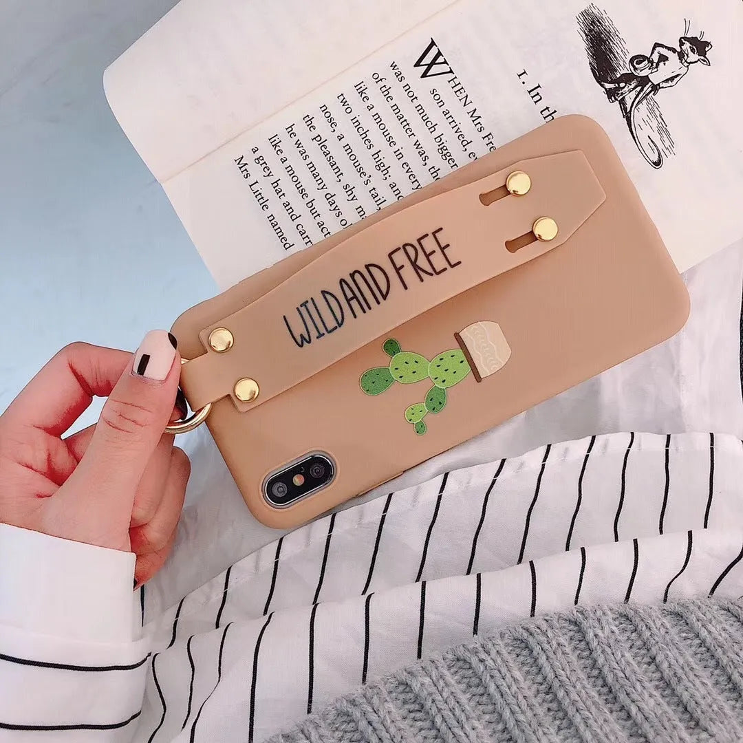 Green iPhone case with graffiti design and integrated wristband holder on back cover