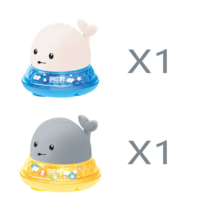 Grey or white electric whale bath toy spraying water with LED lights on a base.
