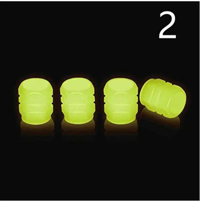Glow-in-the-dark rubber tyre valve caps in five colour options on tyre valve stem