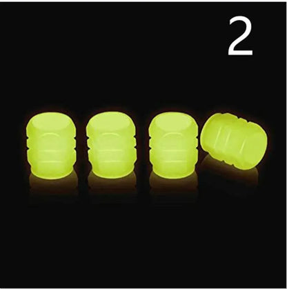 Glow-in-the-dark rubber tyre valve caps in five colour options on tyre valve stem