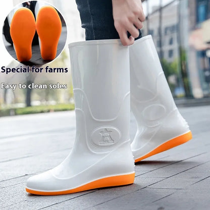 Plastic washable rain boots in white and yellow colours showing high tube Wellington-style design