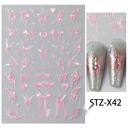 Assortment of black and silver nail sticker designs including cartoon and French tip patterns on a plastic sheet.