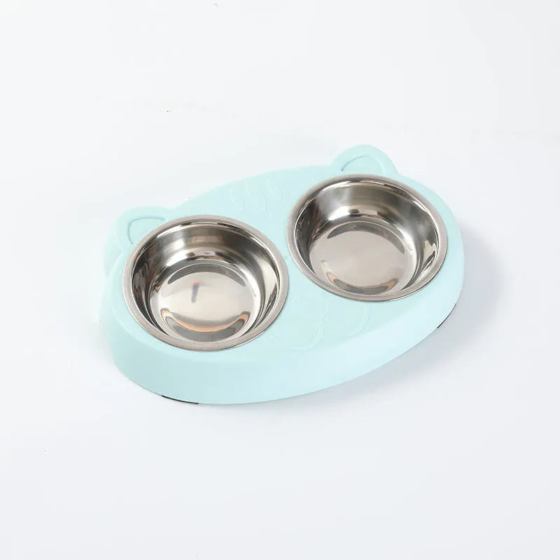 Blue macaron-shaped plastic pet feeder with two food bowls.