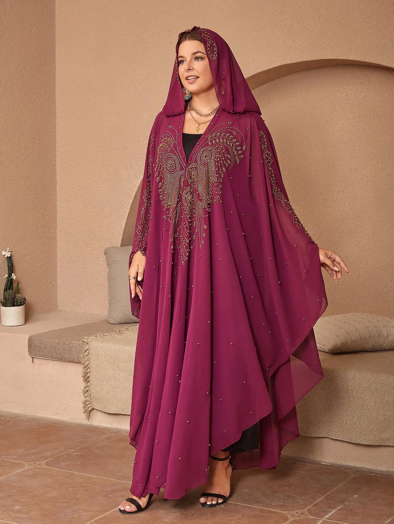 Purple chiffon Muslim style shawl with rhinestone beaded trim laid flat showing its long length.