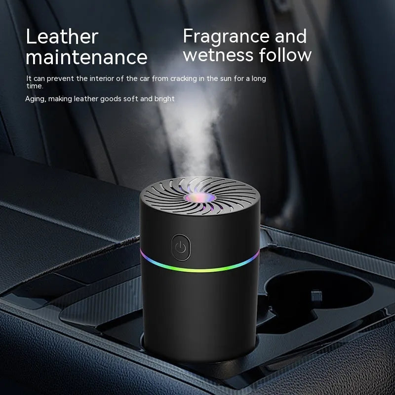 Compact car USB humidifier with aromatherapy function showing water reservoir and control buttons