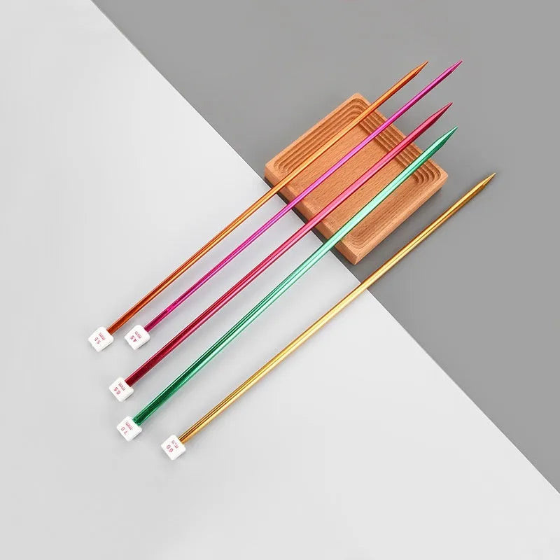 Crochet hook set with 13 sizes from 2.0mm to 10.0mm, each hook has a protective cap, showing lengthened 15cm shafts