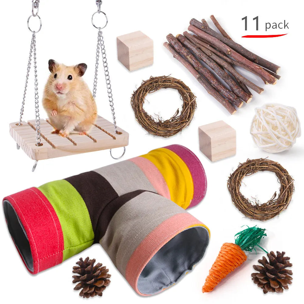 Assorted natural wooden chew toys for small pets including balls, rings, and mats on a plain background.