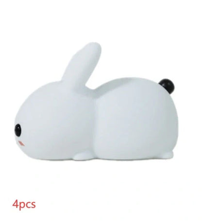 Rabbit-shaped silicone nightlight with warm amber and cool white dual colour illumination, perfect for bedside or home decor