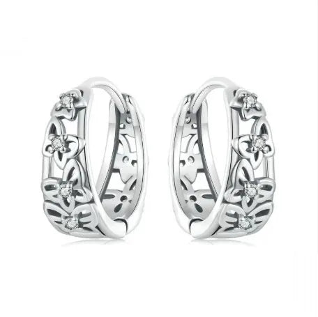 Sterling silver hollow butterfly earrings with zircon accents, retro design measuring 14mm by 5mm