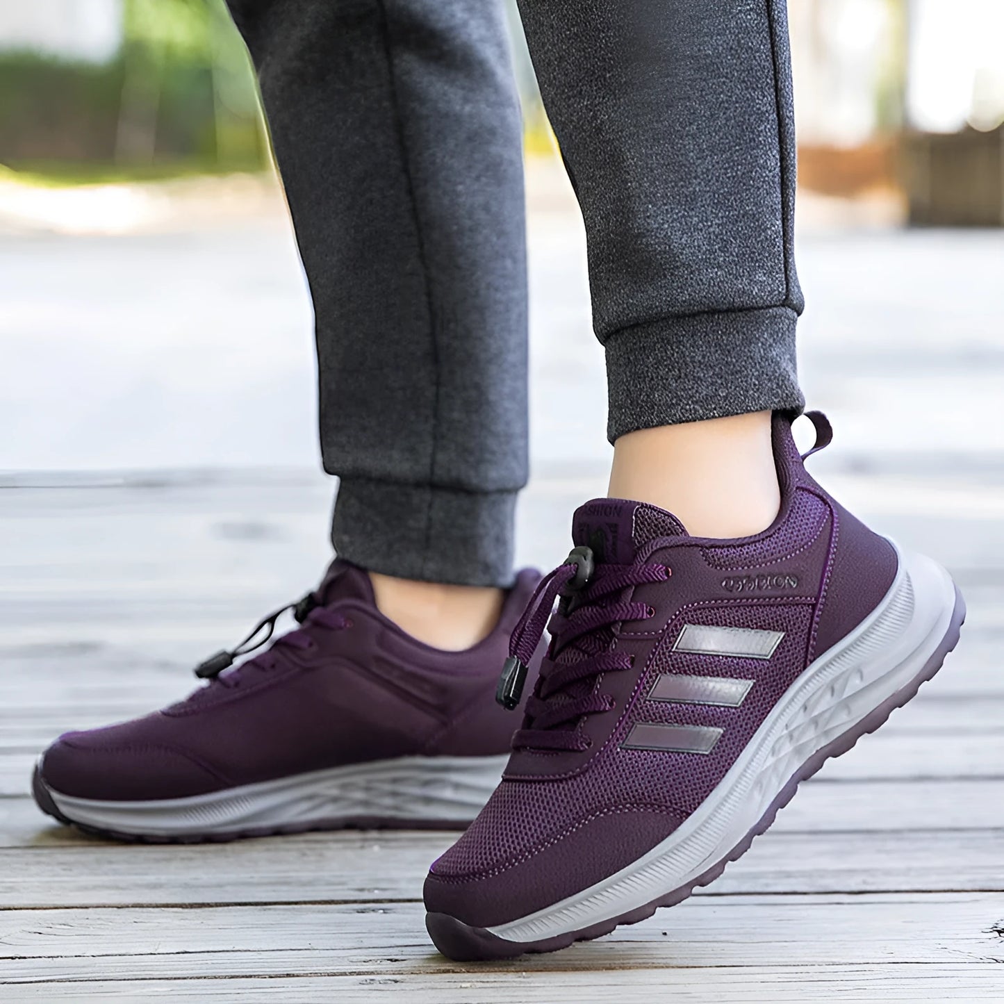 Unisex slip-on casual shoes with mesh upper and elastic band in various colours.