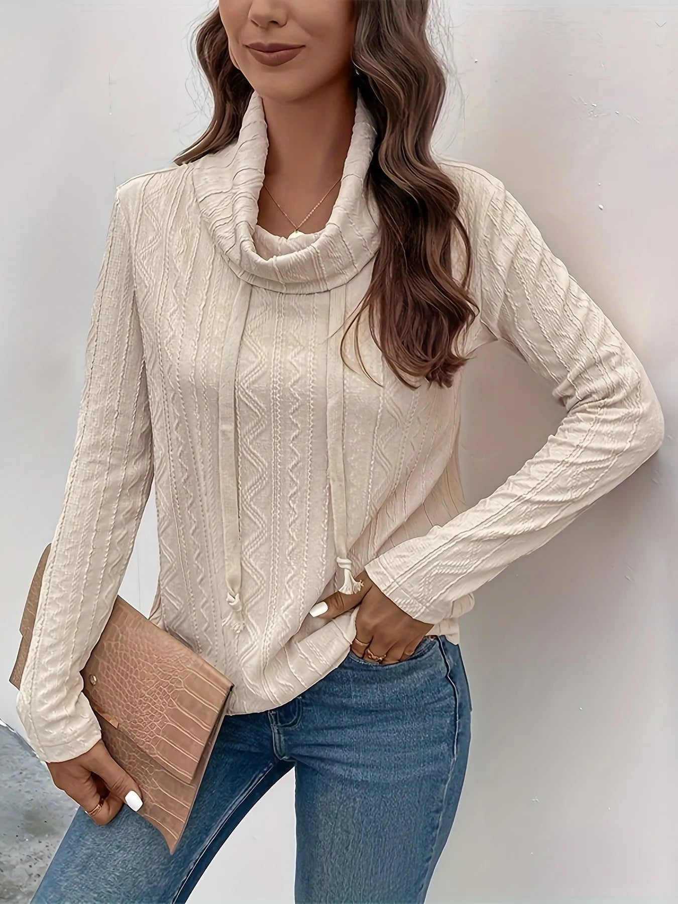 Apricot coloured women's hooded pullover sweater with drawstring and long sleeves