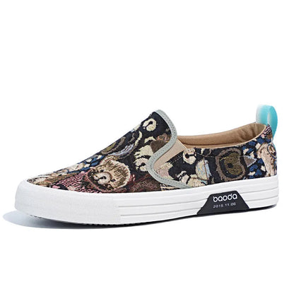 Low-top canvas slip-on sneakers with a vulcanised rubber sole in khaki colour on a neutral background.