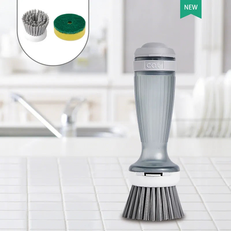 Milk white and mint green pot scrub brush with a soap dispenser handle and replaceable non-scratch bristles.