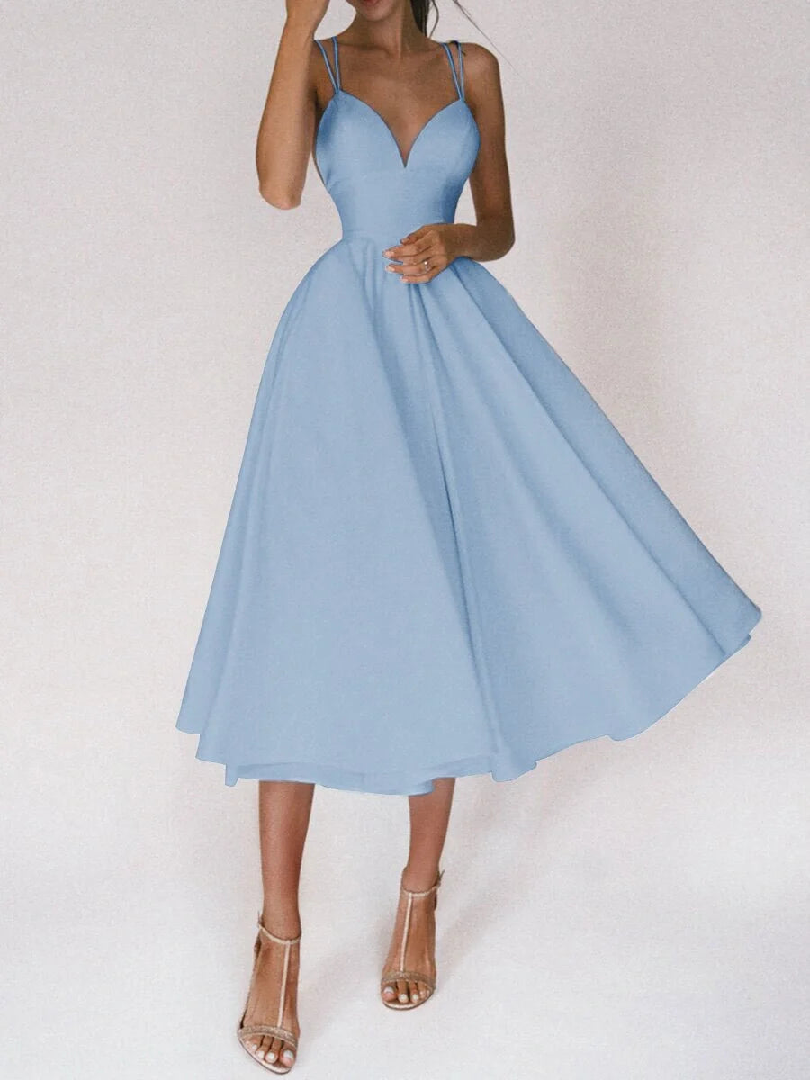 Elegant V-neck dress with adjustable straps, available in a range of vibrant colours for stylish summer wear