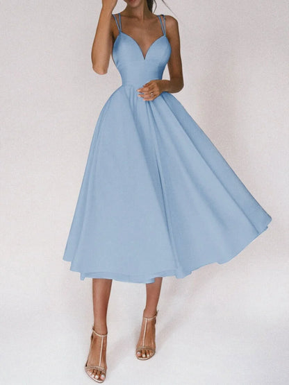 Elegant V-neck dress with adjustable straps, available in a range of vibrant colours for stylish summer wear