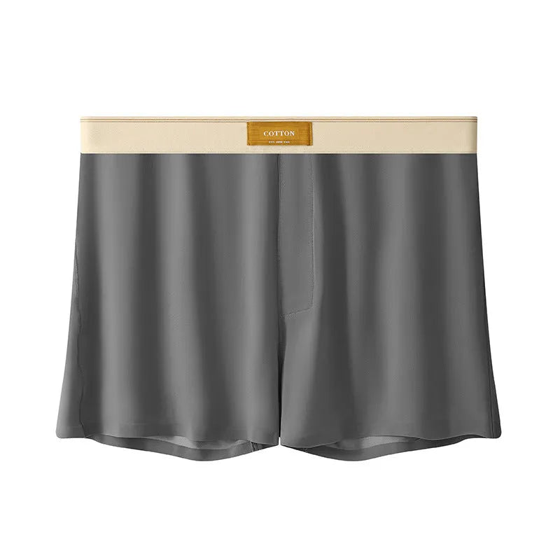 Pack of three pairs of solid colour men's ice silk briefs on a white background