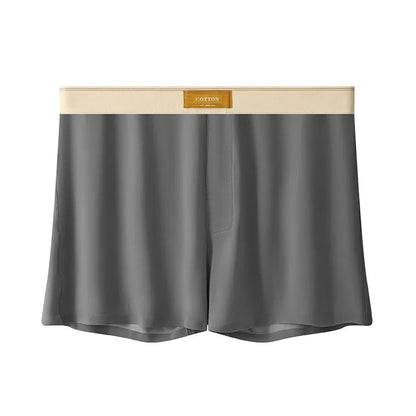 Pack of three pairs of solid colour men's ice silk briefs on a white background