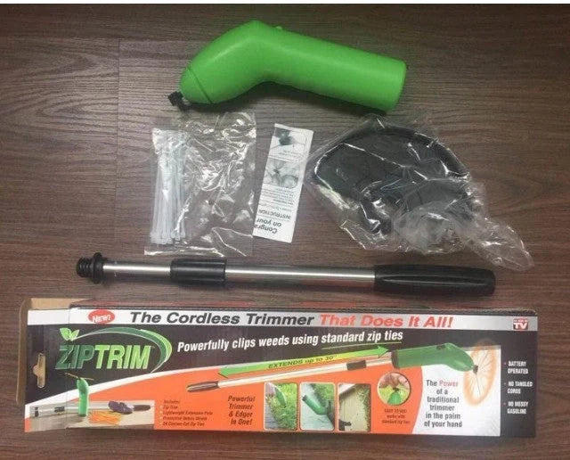 Cordless lawn trimmer with extension pole and debris shield for garden maintenance