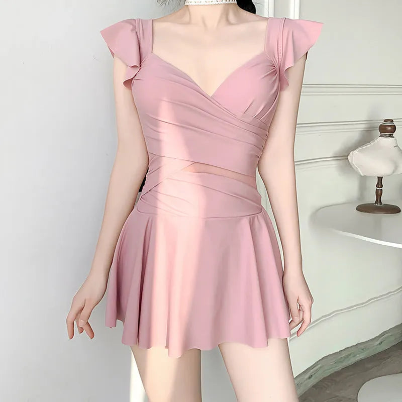 Women's solid colour one-piece swimsuit in milk silk fabric available in black, green, or pink