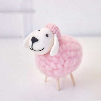 Plush sheep figurines in various colors and sizes, perfect for home decoration and gifting