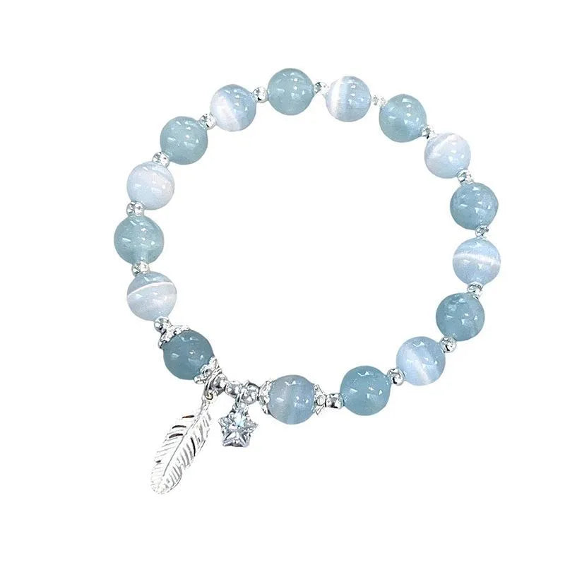 Small white girl crystal bracelet with blue moonlight feather charm and Korean style design