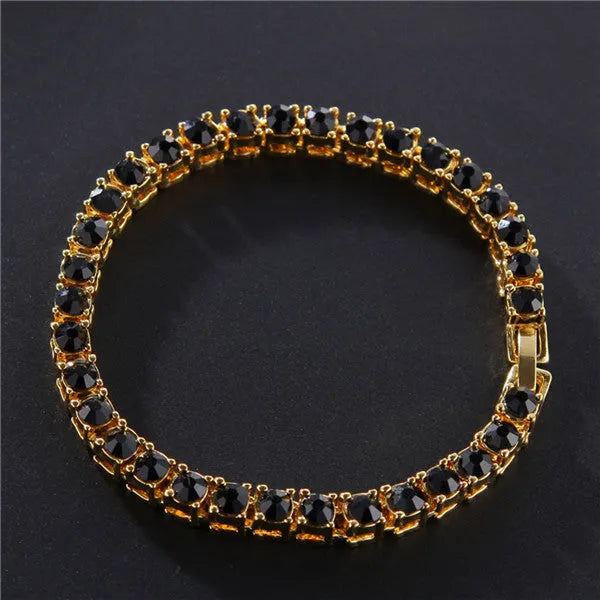 Men's silver alloy link bracelet with a row of clear rhinestones, shown on a wrist.
