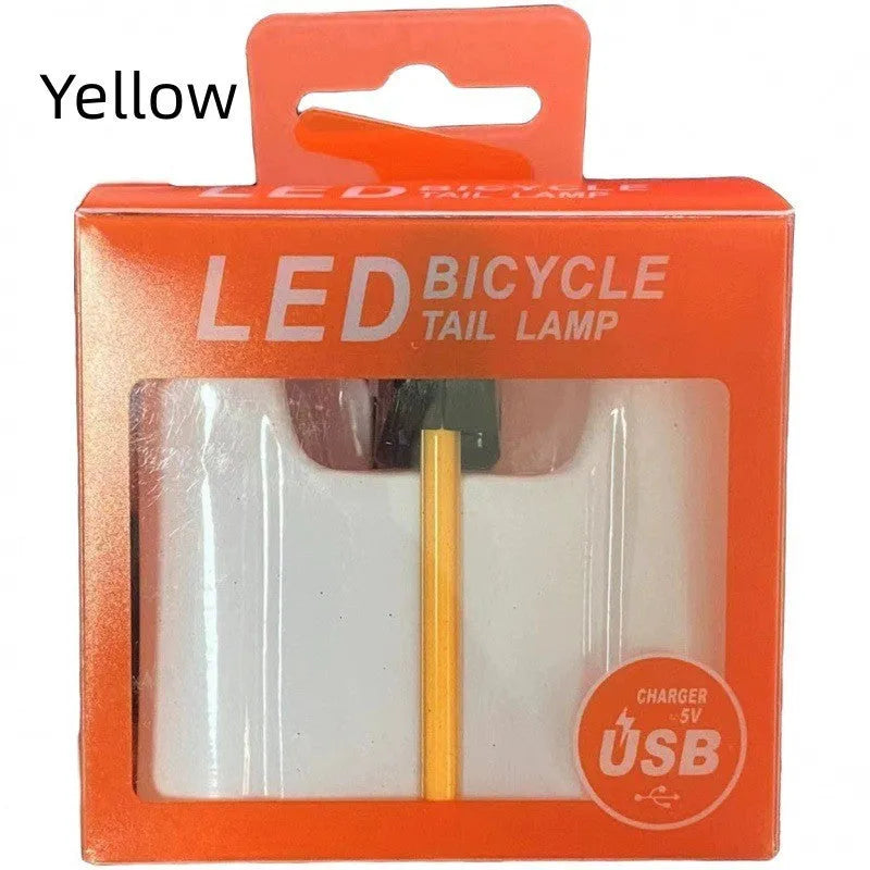 Waterproof USB rechargeable bicycle tail light in blue, pink, red, white, or yellow colours
