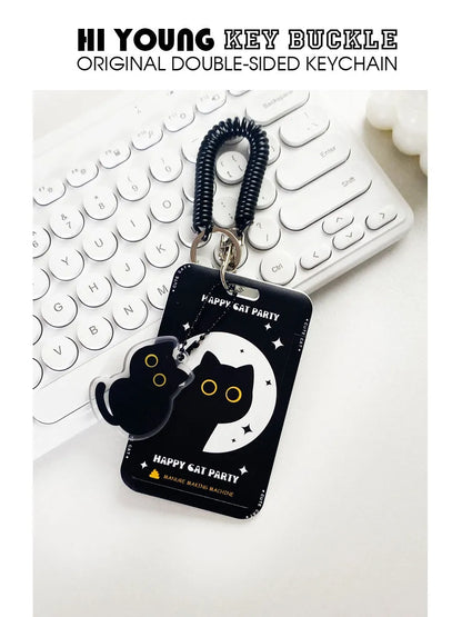 Cartoon cat design plastic card holder sleeve with a metal ferrule pendant clip attached.