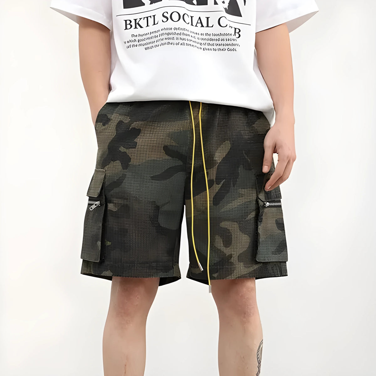 Men's camouflage coloured cargo shorts with multiple pockets and cropped leg length