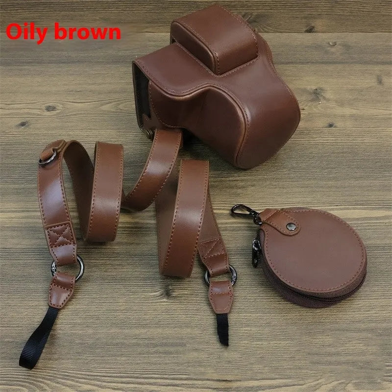 PU shoulder bag for a single mirrorless camera, shown in oil skin or palm print finish