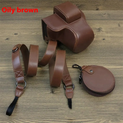 PU shoulder bag for a single mirrorless camera, shown in oil skin or palm print finish