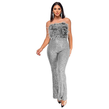 Women's sleeveless backless jumpsuit with flared legs in a wine red colour.