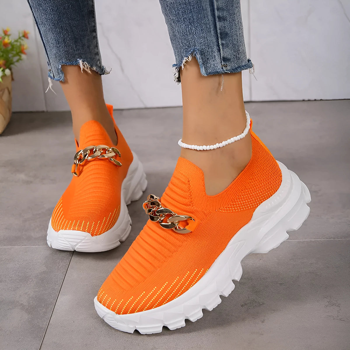 Women's chain mesh slip-on flat shoes with fly weaving upper and chunky EVA sole in beige, black, or orange