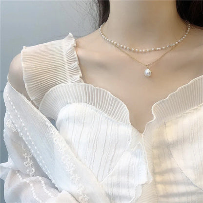 Elegant double-layer pearl necklace for women in gold, showcasing sophisticated design and high-quality craftsmanship.