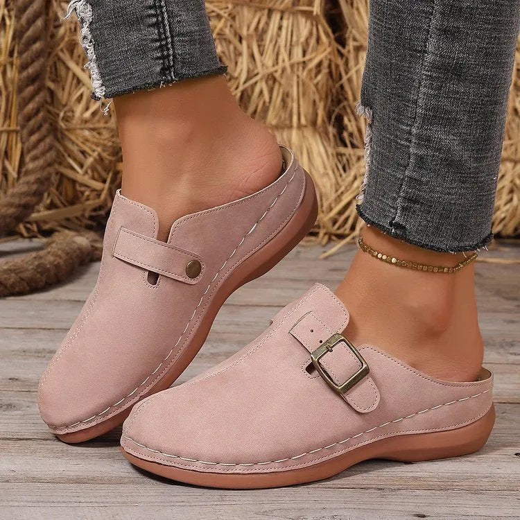 Women's casual wedge slippers in cloth with a rubber sole, shown in light brown colour.
