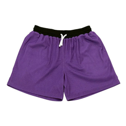 Men's black mesh athletic shorts with built-in liner on a grey background.