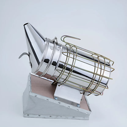 Stainless steel and leather manual bee smoker for beekeeping, showing 10.5cm barrel.