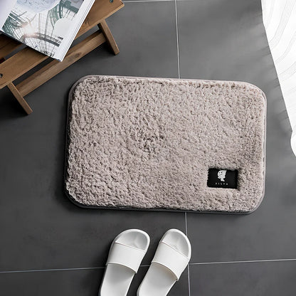 Rectangular anti-slip bathroom mat with polyester fibre construction in multiple colour options