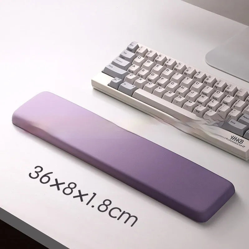 Square cloth-covered silica gel wrist rest mouse pad on a desk.