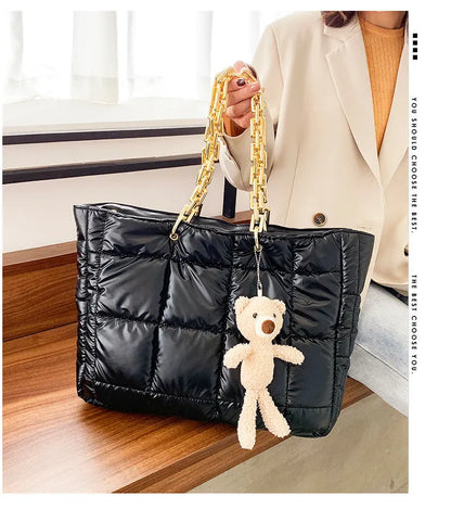 Women's large chain tote shoulder bag in black with 45cm strap, zip fastening and internal pockets